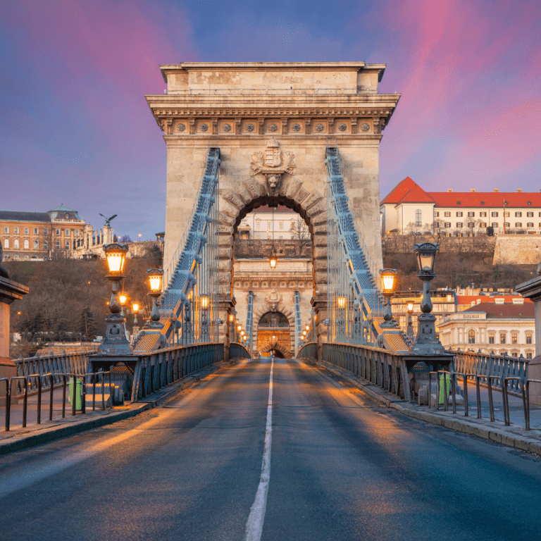 cityscape image of budapest skyline with the Szechenyi Chain Bridge during beautiful sunrise